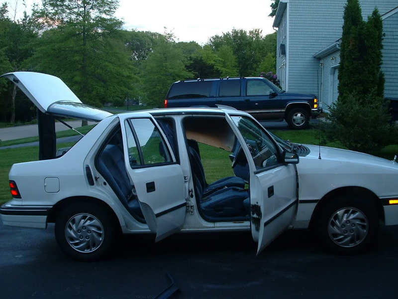 The rear seat folds down as well, just not flat. Photo from fourtitude.com